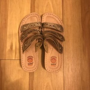 Gold sandals with adjustable straps